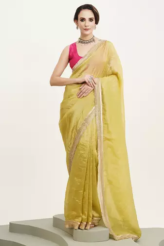 Lime yellow color embellished sequinned silk saree for beautiful partywear saree