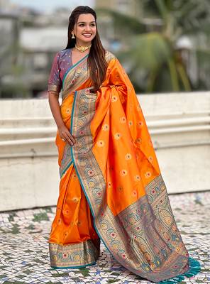 Orange soft silk blend wevon meenakari trending partywear saree 1