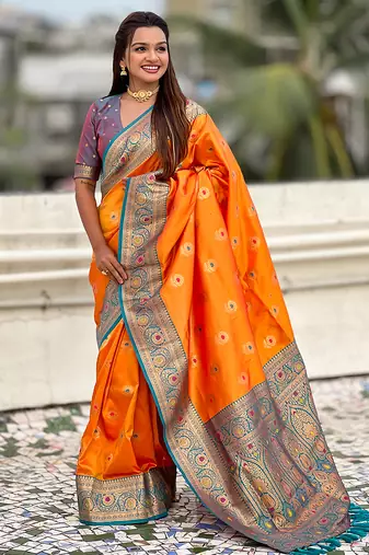 Orange color soft silk fabric wevon meenakari designer trending partywear saree