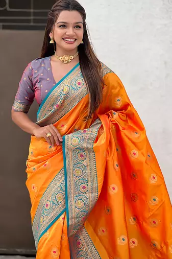 Orange soft silk blend wevon meenakari trending partywear saree
