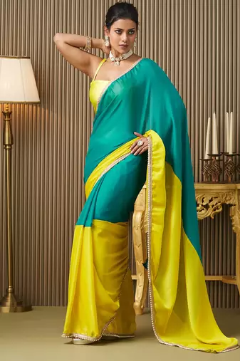 Teal color chiffon fabric motiwork lace colorblocked ceremonial saree