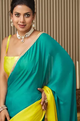 Teal chiffon motiwork lace blocked ceremonial saree