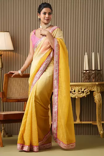 Yellow color chiffon fabric embroidered gotta patti work ceremonial saree