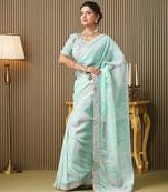 Turquoise blue color organza fabric embroidered embellished work ceremonial saree