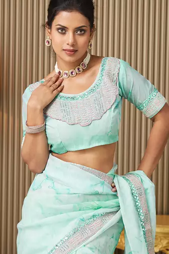 Turquoise blue organza embroidered embellished work ceremonial saree