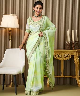 Green organza embroidered embellished work ceremonial saree 1