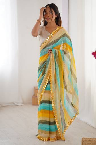 Yellow color chiffon fabric designer laheriya printed saree with mirror cut work