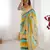Yellow color chiffon fabric laheriya printed saree with mirror cut work