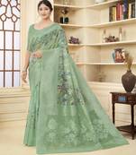 Green color wevon jacquard with printed rich silk fabric stylish ceremonial saree
