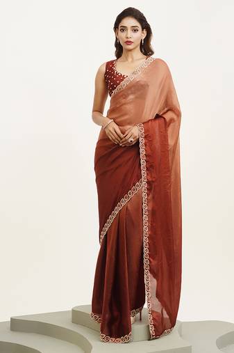 Rust color satin fabric embellished beads and stones work fancy saree