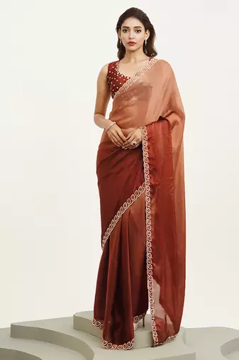 Rust color satin fabric embellished beads and stones work fancy saree