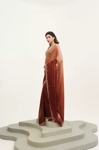Rust satin embellished beads and stones work fancy saree