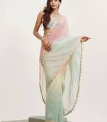 Pink color tissue fabric embellished sequinned work fancy saree