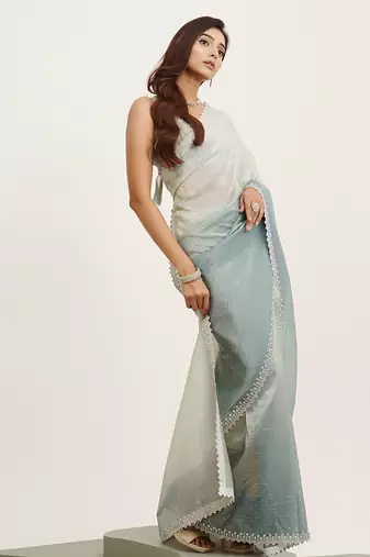 Turquoise blue tissue embellished beads and stones work fancy saree