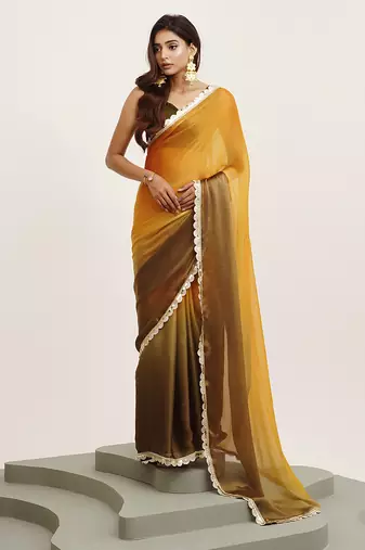 Mustard color chiffon fabric embellished sequinned work fancy saree