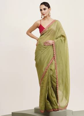 Green tissue embellished sequinned work fancy saree 1