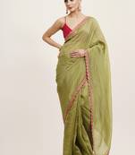 Green color tissue fabric embellished sequinned work fancy saree