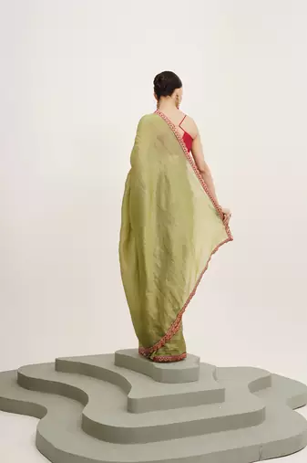 Green tissue embellished sequinned work fancy saree