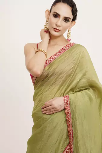 Green tissue embellished sequinned work fancy saree