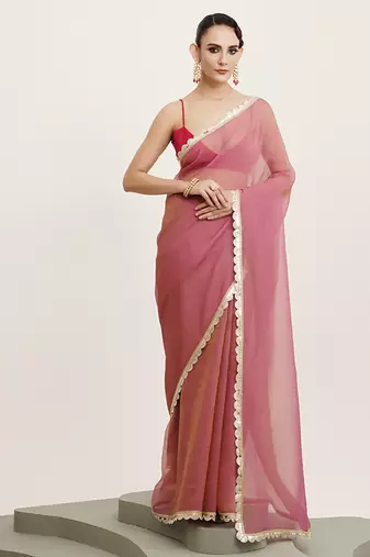 Pink color tissue fabric embellished sequinned work fancy saree