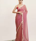 Pink color tissue fabric embellished sequinned work fancy saree