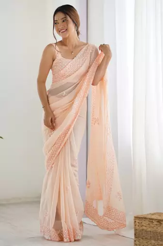 Peach color smart and sparkling bollywood party style sequins work saree