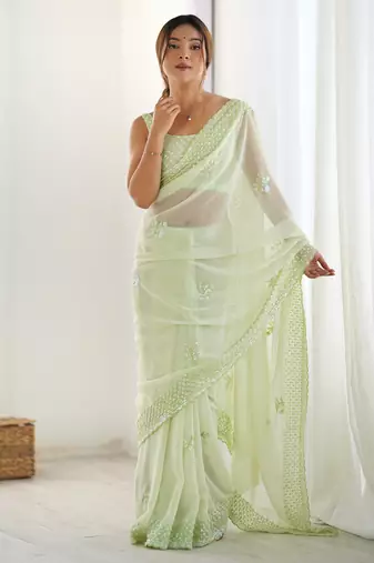 Pista color smart and sparkling bollywood party style sequins work saree