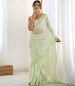 Pista color smart and sparkling bollywood party style sequins work saree