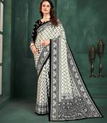 White color sophisticated digital foil printed crepe silk saree