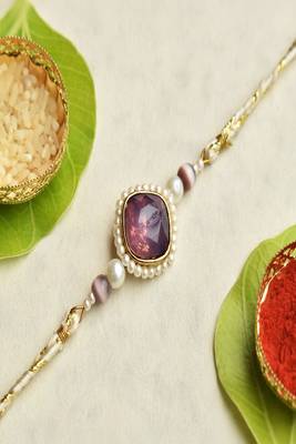Royal amethyst pearl rakhi with roli chawal capsules 1