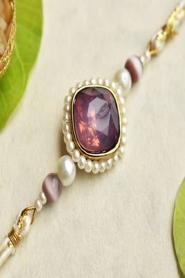 Royal amethyst pearl rakhi with roli chawal capsules 2