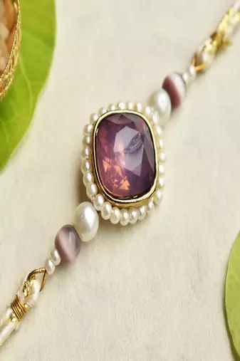 Royal amethyst pearl rakhi with roli chawal capsules
