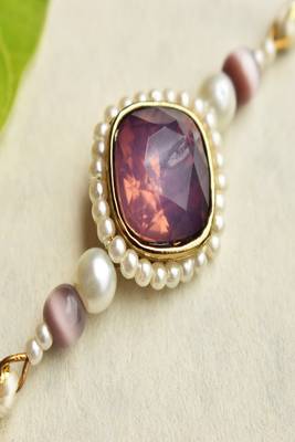 Royal amethyst pearl rakhi with roli chawal capsules 3