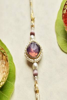Royal amethyst pearl rakhi with roli chawal capsules 5