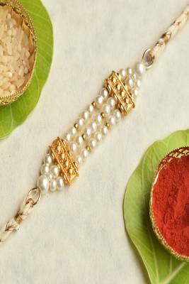 Pearl harmony rakhi with roli chawal capsules 2
