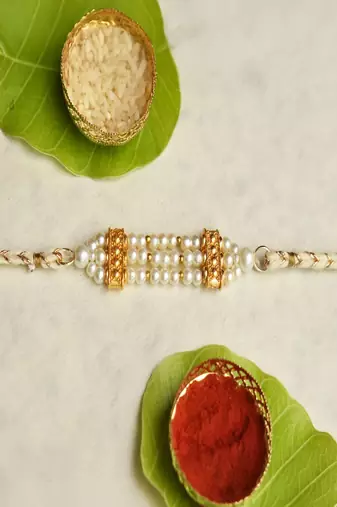 Pearl harmony rakhi with roli chawal capsules