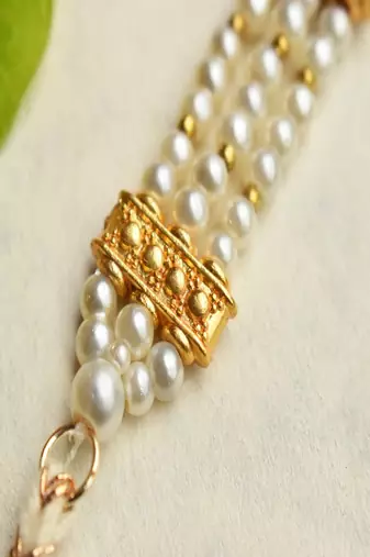 Pearl harmony rakhi with roli chawal capsules