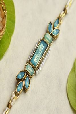 Ocean bloom rakhi with roli chawal capsules 3
