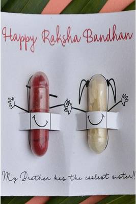 Mor pankh rakhi with roli chawal capsules 5
