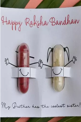 Mor pankh rakhi with roli chawal capsules