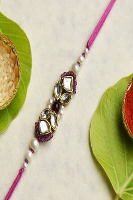 Kundan noor rakhi with roli chawal capsules 1