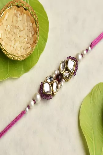 Kundan noor rakhi with roli chawal capsules