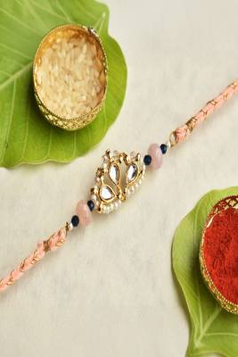 Kundan crown rakhi with roli chawal capsules 1