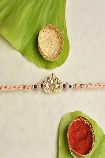 Kundan crown rakhi with roli chawal capsules