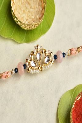 Kundan crown rakhi with roli chawal capsules 3