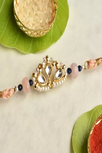Kundan crown rakhi with roli chawal capsules