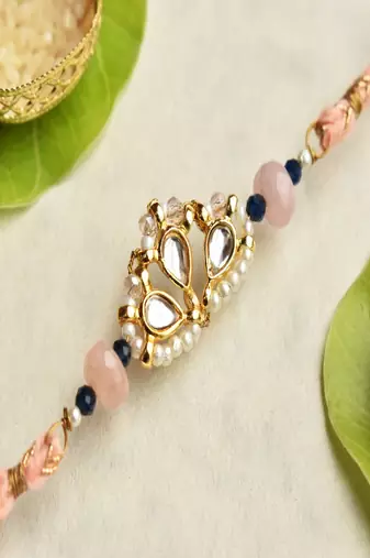 Kundan crown rakhi with roli chawal capsules