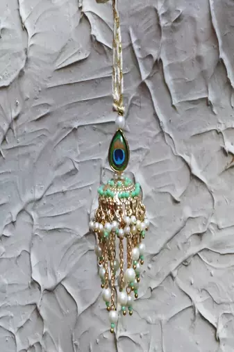 Peacock jhoomar lumba with roli chawal capsules