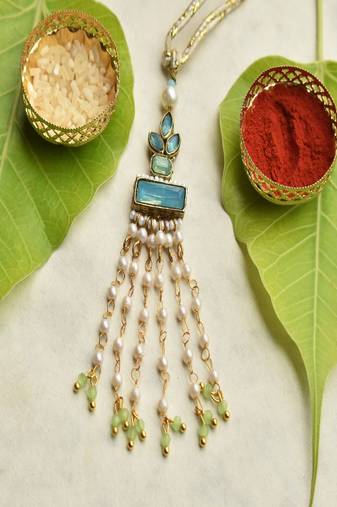 Aqua blossom lumba with roli chawal capsules