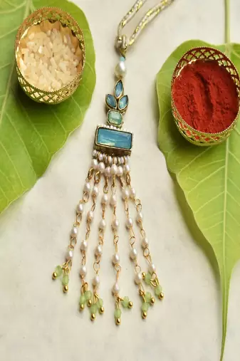 Aqua blossom lumba with roli chawal capsules